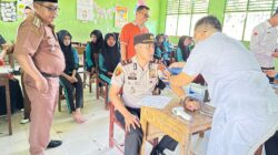 Kapolsek Ampek Nagari Dukung “Aksi Bergizi” di MTsN 13 Agam, Ikut Jalani Tes Kesehatan