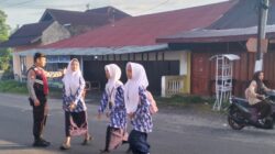 Polsek Tanjung Mutiara Kawal Aktivitas Pagi Warga dan Pelajar