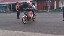 Polsek Tanjung Mutiara Siaga Atur Lalu Lintas Pagi, Pastikan Pelajar Aman ke Sekolah