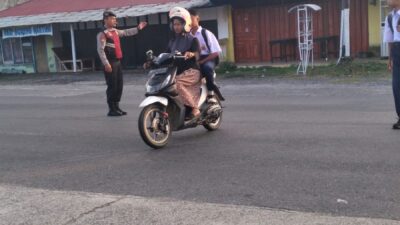 Polsek Tanjung Mutiara Siaga Atur Lalu Lintas Pagi, Pastikan Pelajar Aman ke Sekolah